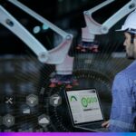 Indústria 4.0 com trabalhador monitorando robôs industriais e analisando dados em laptop, simbolizando automação e transformação digital no setor industrial.