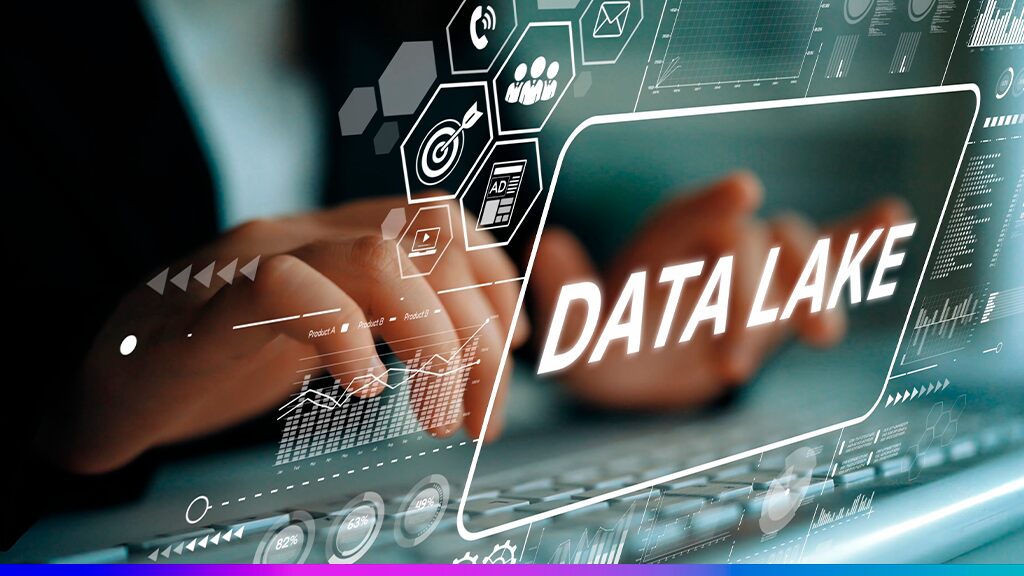 Pessoa digitando em laptop com o termo “Data Lake” em destaque e ícones digitais flutuantes, simbolizando o armazenamento e análise de grandes volumes de dados.